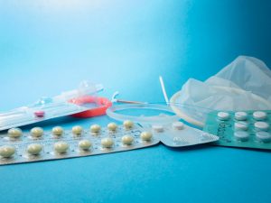 Experts Explain How All Hair Types React To Birth Control