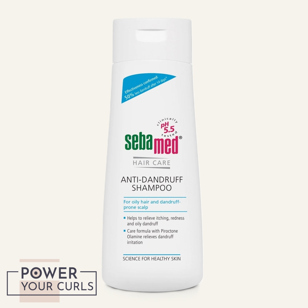 A bottle of sebamed anti-dandruff shampoo.