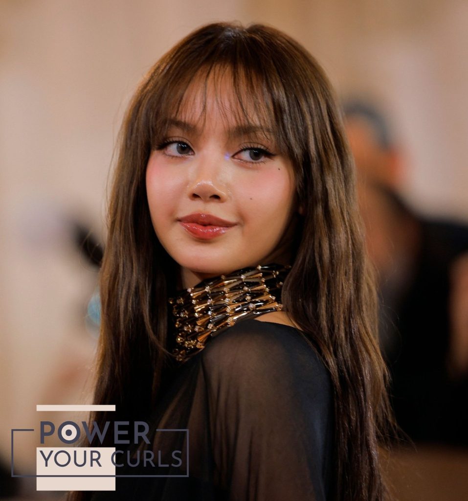 K-pop idol Lisa from Blackpink at the 2026 Golden Globes showing off her new brunette hair.